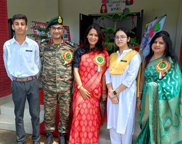 An Army officer posing with faculty and students at Kalidhar Army school on Monday.