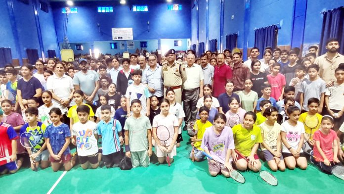 Badminton players posing along with dignitaries during an inaugural event. Badminton players posing along with dignitaries during an inaugural event.