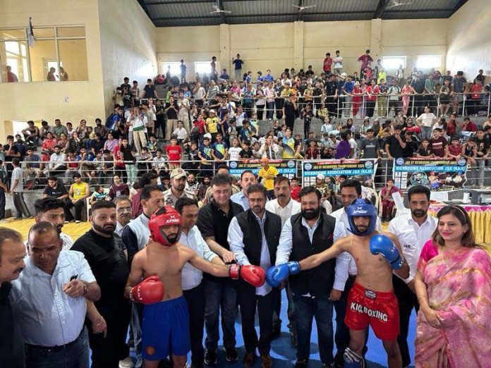 page10-1 Dignitaries posing along with players during a programme.