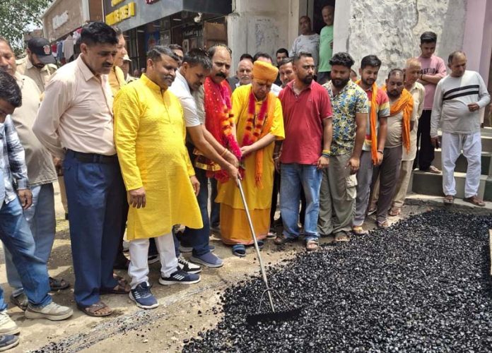 MLA Bishnah Dr Rajeev Bhagat kick starting macadamization work on Saidgarh to Rehal Bazar Road.