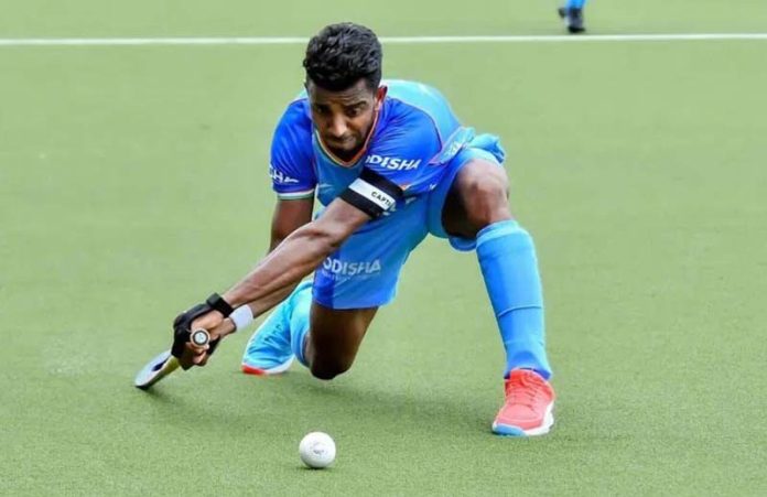 A player in action during a hockey match. A player in action during a hockey match.