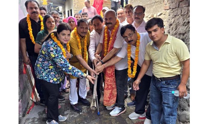 MLA Yudhvir Sethi inaugurating sewerage links in Jammu.