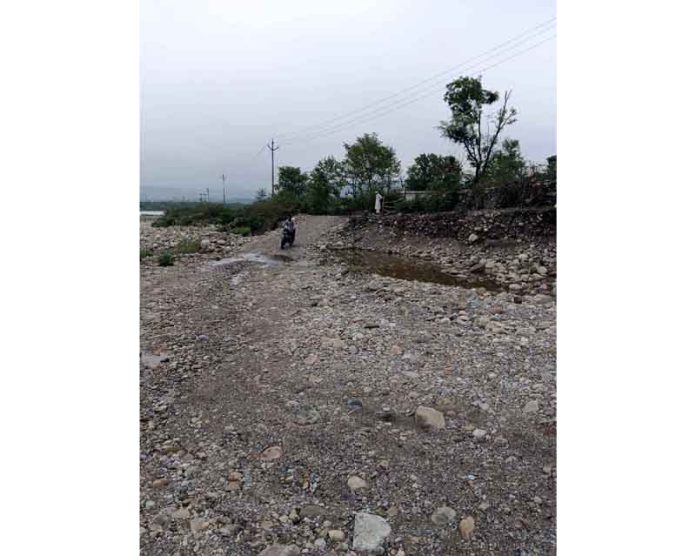 A view of dilapidated condition of Chhota Kashi temple road in Reasi. —Excelsior/Mengi