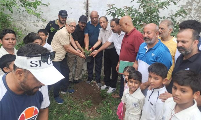 Dignitaries posing along with budding cricketers at Parade Ground, Jammu. Dignitaries posing along with budding cricketers at Parade Ground, Jammu.
