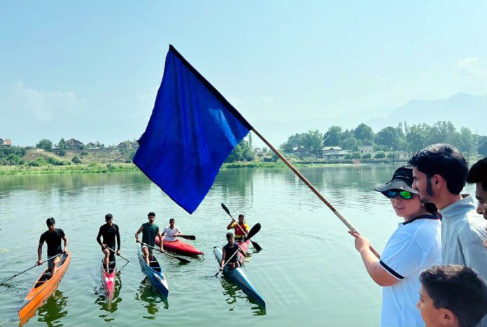 Bilquis Mir flagging off a programme.