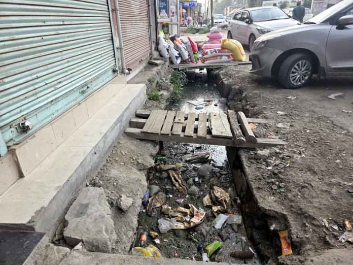 A view of an open drain at new colony market Sopore in north Kashmir’s Baramulla. —Excelsior/Aabid Nabi