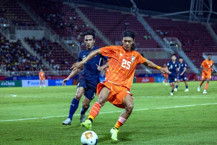 Football players in action during a match between India and Thailand on Wednesday.