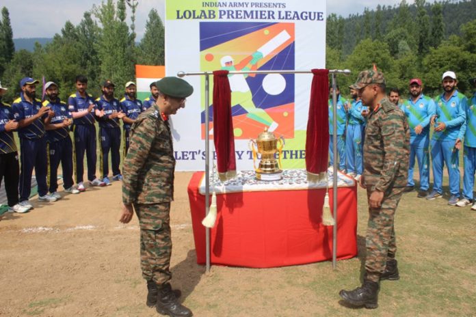 Dignitaries unveiling Lolab Premier League Trophy. Dignitaries unveiling Lolab Premier League Trophy.