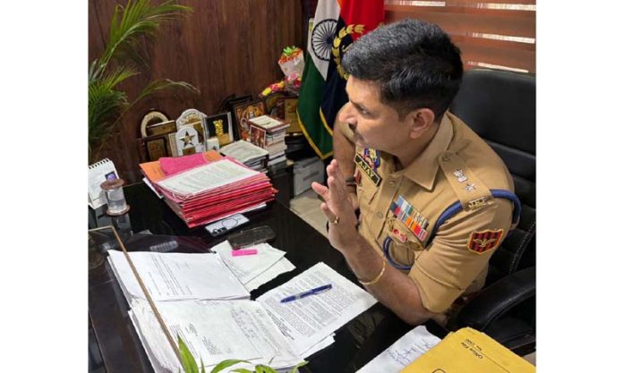 SP South Ajay Sharma interacting with students.