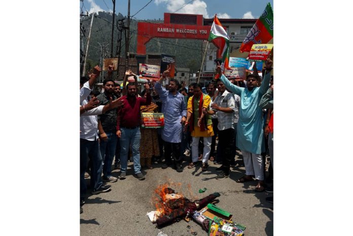 BJP and BJYM workers raise slogans during a protest demonstration in Ramban on Wednesday.