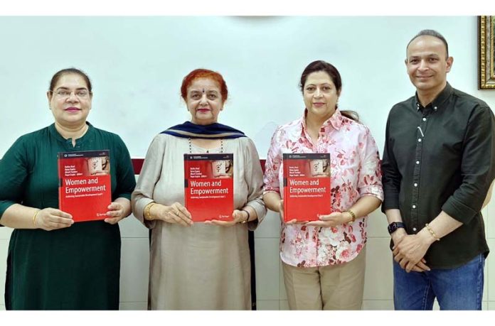 Dignitaries posing along with newly published Book. Dignitaries posing along with newly published Book.