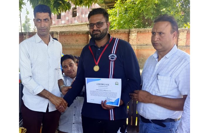 Dignitary presenting certificate to a player.