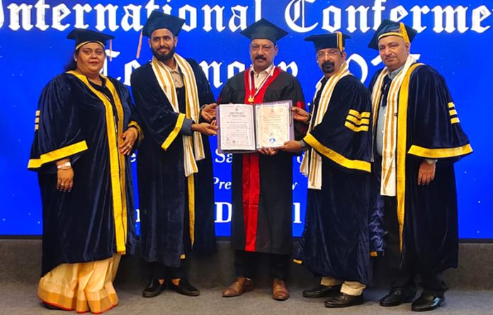 Kuldeep Kumar Gupta receiving honorary Doctorate in Sports by Cambridge Digital University at Goa.
