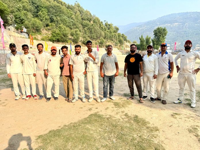 A Cricket team posing during a match at Ghat, Doda.