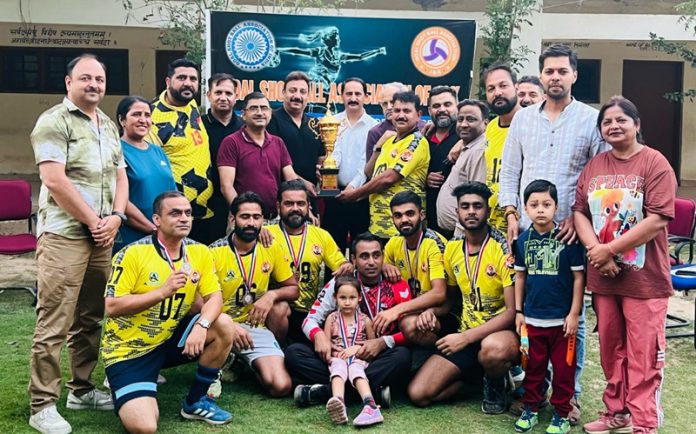 Players posing with trophy alongside dignitaries. Players posing with trophy alongside dignitaries.
