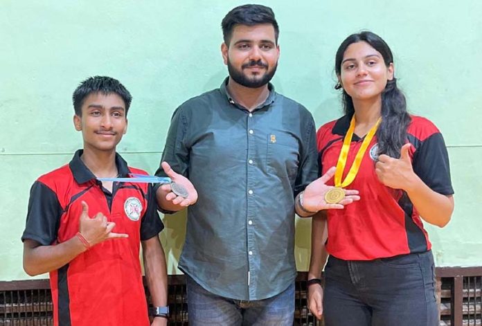 Kalarippayattu Association General Secretary Danish Sharma posing along with Martial Art players.