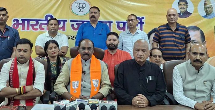 Lal Singh Arya, national president of BJP SC Morcha addressing a press conference in Jammu.