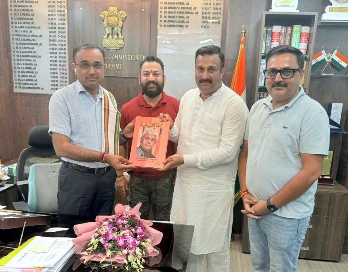 Mahant Rohit Shastri presenting special felicitation volume on LG, Manoj Sinha to Divisional Commissioner Jammu. Mahant Rohit Shastri presenting special felicitation volume on LG, Manoj Sinha to Divisional Commissioner Jammu.