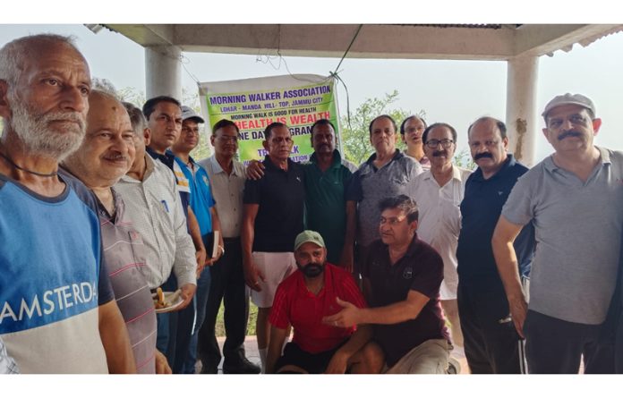 O P Sharma, a well known Tree Talk founder posing along with the members of MWA in Jammu. O P Sharma, a well known Tree Talk founder posing along with the members of MWA in Jammu.