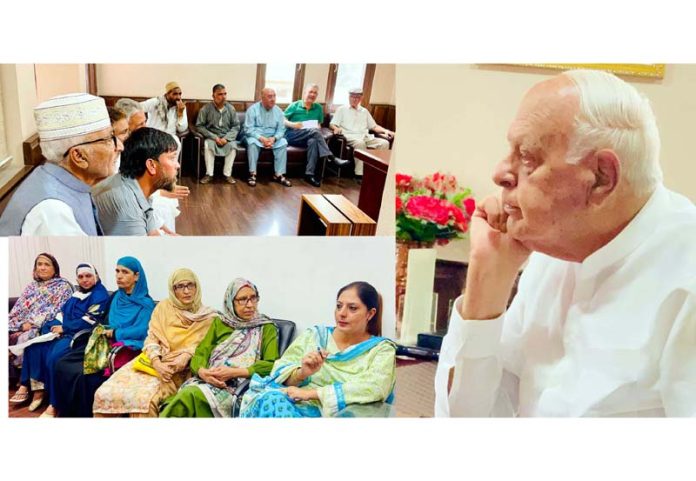 NC President Dr Farooq Abdullah interacting with office bearers and delegations at Srinagar on Monday.
