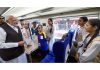 PM Narendra Modi interacting with the students on board the train.