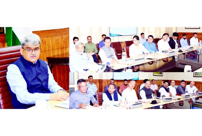 Chief Secretary Atal Dulloo chairing a meeting on Friday.