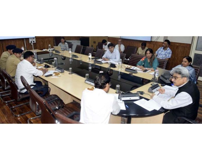 CS Atal Dulloo chairing a meeting at Srinagar on Saturday.