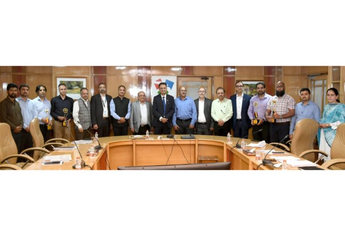 MD & CEO Amitava Chatterjee posing along with the J&K Bank officers on Monday.