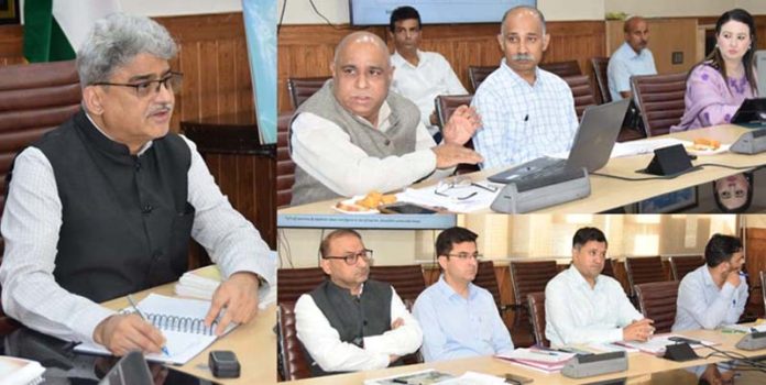 Chief Secy, Atal Dulloo chairing a meeting at Srinagar on Thursday.