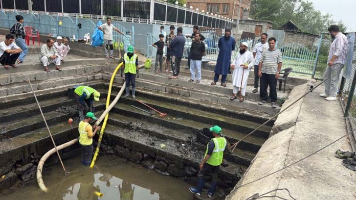 Restoration work being carried out on Saida Kadal spring on Wednesday.