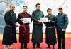 Ist volume of book on Ladakh heritage being unveiled by the CEC LAHDC, Tashi Gyalson and others during an event at Leh.