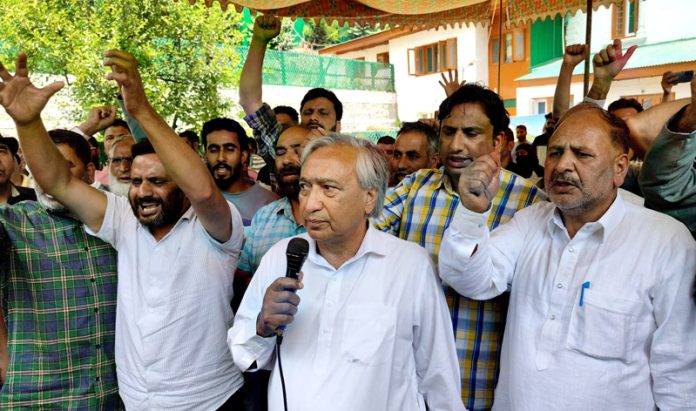 CPI(M) leader, M Y Tarigami leading a protest in Srinagar on Tuesday. -Excelsior/Shakeel CPI(M) leader, M Y Tarigami leading a protest in Srinagar on Tuesday. -Excelsior/Shakeel