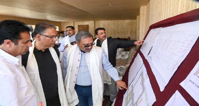 A delegation of judges examining project designs of upcoming court complexes in Drass and Sankoo.