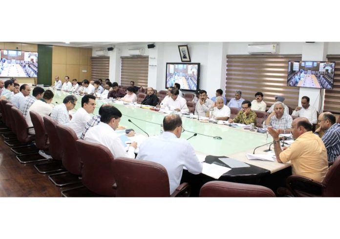 DyCM chairing a meeting at Jammu on Friday.