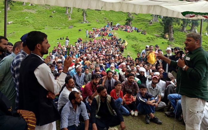 MLA Banihal, Sajjad Shaheen addressing people in Zomando Mangit area.