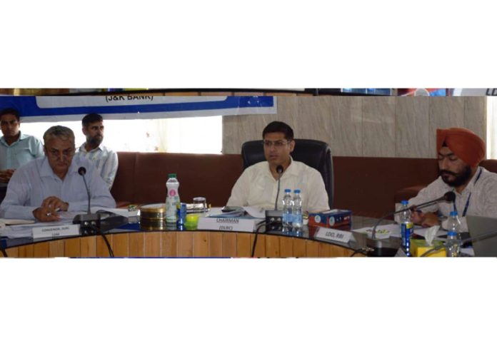 DDC Poonch chairing a meeting on Thursday.