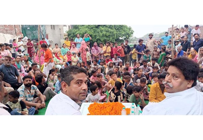 JKPCC working president Raman Bhalla addressing a public gathering in Jammu.