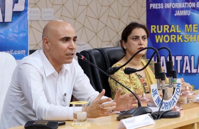 DC Kishtwar Pankaj Kumar Sharma and Director PIB Jammu Neha Jalali during a media workshop in Kishtwar.