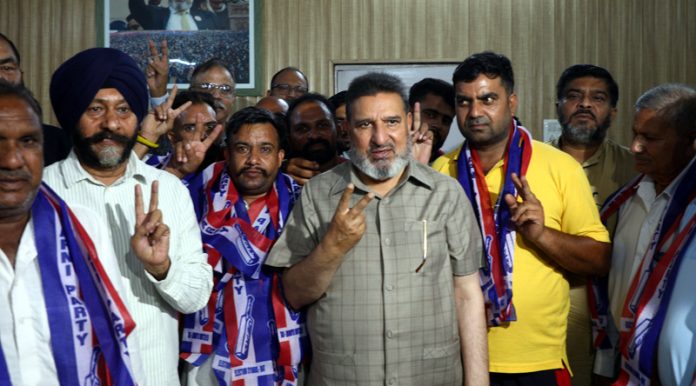 Apni Party chief Altaf Bukhari and senior leader Manjit Singh during party function in Jammu. — Excelsior/Rakesh