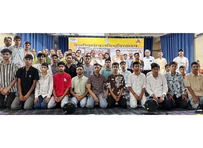 Participants along with faculty members and officials posing during an awareness programme on Friday. Participants along with faculty members and officials posing during an awareness programme on Friday.