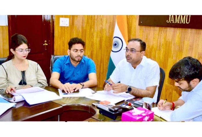 Div Com Ramesh Kumar chairing a meeting at Jammu on Tuesday.