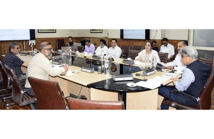 CS Atal Dulloo chairing a meeting at Srinagar on Friday. CS Atal Dulloo chairing a meeting at Srinagar on Friday.