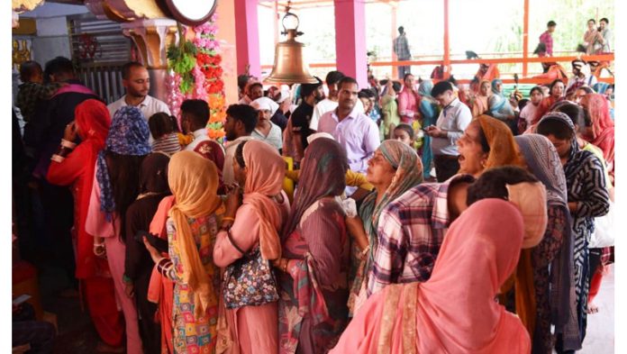 People offering prayer at Lord Shiva temple at Sud Mahadev.