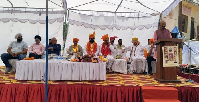 MLA Akhnoor Mohan Lal among other dignitaries during a function at Jeo Pota Ghat in Akhnoor town.