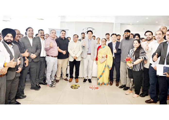 Jong Tae Park, executive director of HMIL posing along with others in Jammu. Jong Tae Park, executive director of HMIL posing along with others in Jammu.