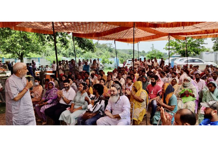 Sham Lal Sharma addressing a gathering during an awareness camp in Jammu North.