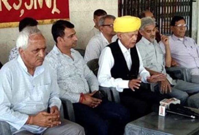 President of Dogra Brahmin Pratinidhi Sabha addressing media persons at Jammu on Saturday.