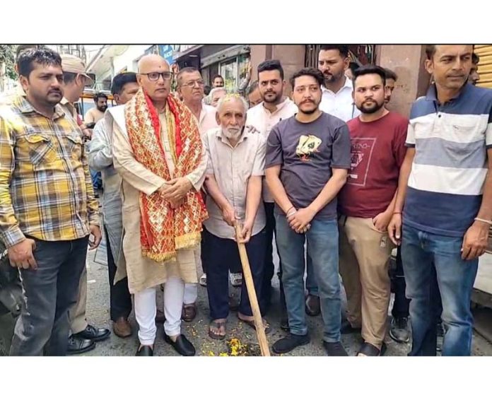 Rajinder Sharma, former Mayor inaugurating a sewerage project in Jammu.