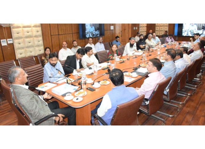 Union Secretary chairing a meeting on Thursday.