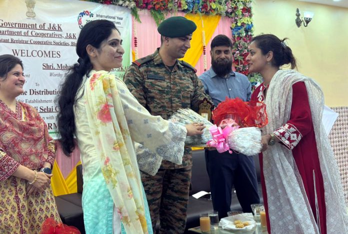 Commissioner Secretary Cooperative Deptt Babila Rakwal and other officers during launch of cutting and tailoring centre at Akhnoor.